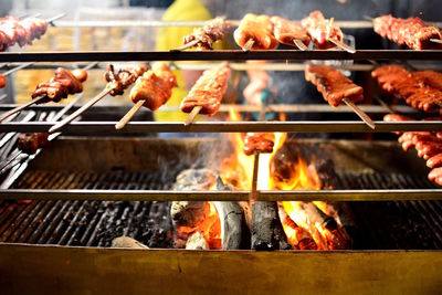 Close-up of meat on barbecue grill