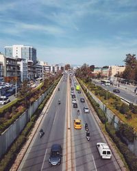 High angle view of vehicles on road against sky