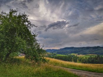 Scenic view of land against sky