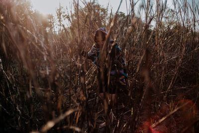 Man standing in forest