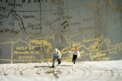 People walking on wall
