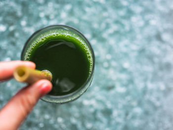 Close-up of hand holding drink