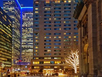 Illuminated cityscape at night