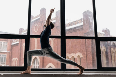 A man engaged in yoga and meditation, performing asanas