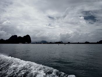 Scenic view of sea against cloudy sky