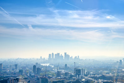 High angle view of buildings in city against sky