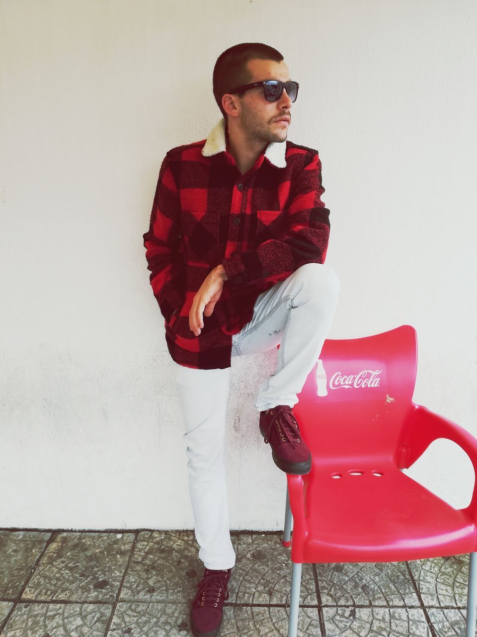 sunglasses, young adult, young men, red, one person, fashion, lifestyles, real people, full length, casual clothing, sitting, portrait, chair, leisure activity, standing, relaxation, day, outdoors, adult, people