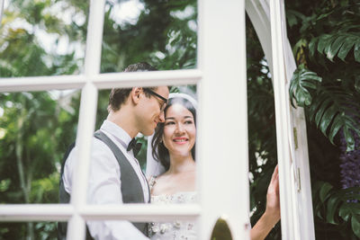 Close-up of couple holding hands