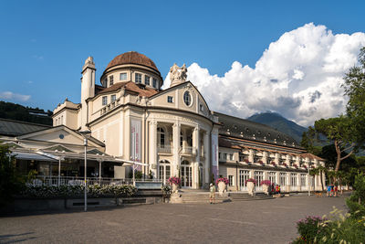 Buildings in city against sky