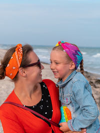 Mother and daughter at beach