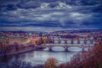 Cityscape against cloudy sky