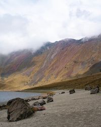 Scenic view of rocks in mountains against sky