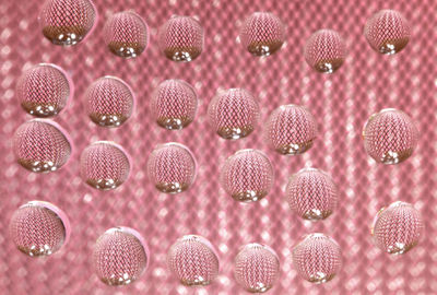 Full frame shot of pink waterdrops with repetition art