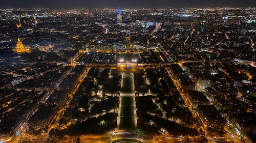 High angle view of illuminated city buildings at night