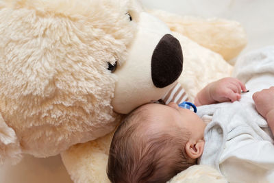 Cute baby sleeping on bed