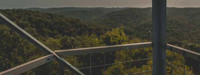 Scenic view of field seen through glass