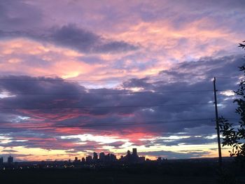 Scenic view of dramatic sky at sunset