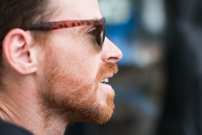 Close-up of bearded man wearing sunglasses