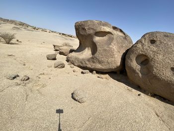 Rock formation on land against sky