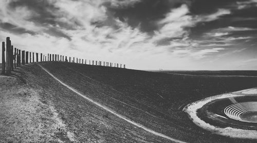 View of road against cloudy sky