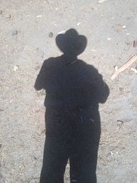 High angle view of silhouette shadow on ground