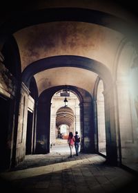 People walking in corridor