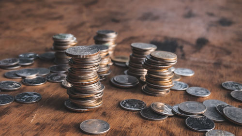 High angle view of coins on table