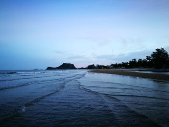 Scenic view of sea against sky at sunset