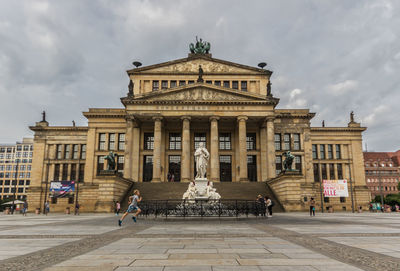 View of historic building against cloudy sky