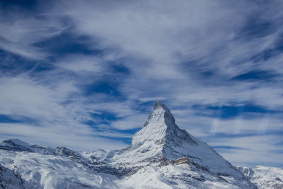 Snow covered mountain against sky