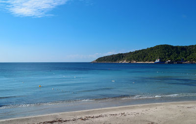 Scenic view of calm sea against sky