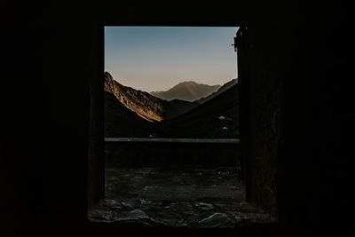 Scenic view of mountains against sky during sunset