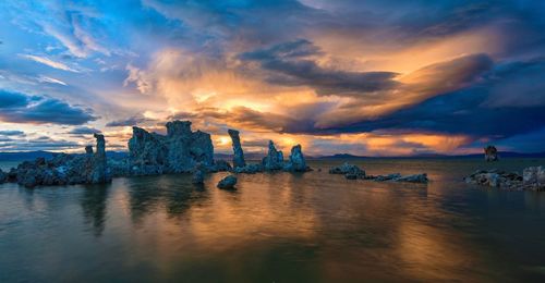 Panoramic view of sea against sky during sunset