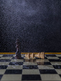 High angle view of chess pieces on table