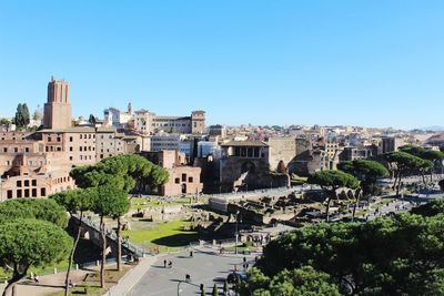 High angle view of townscape against clear blue sky