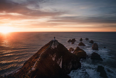 Scenic view of sea against sky during sunset