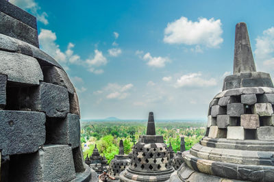 Ancient temple against building