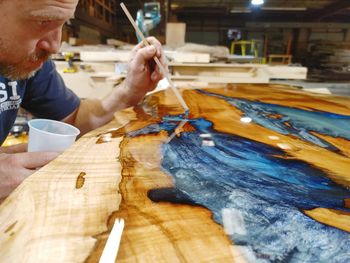 Man working on wood