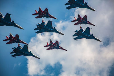 Low angle view of airshow in sky