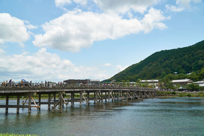 Bridge over river against sky
