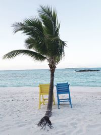 Lifeguard hut on beach against clear sky