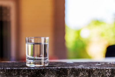 Close-up of wine in glass on table