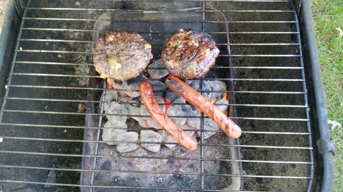 Close-up of meat on barbecue grill