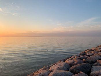 Scenic view of sea against sky during sunset