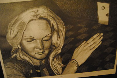 Close-up of painting on wall