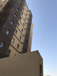 Low angle view of buildings against clear sky