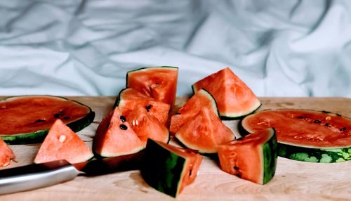 Close-up of chopped fruits on table