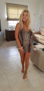 Portrait of a smiling young woman at home