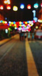 Defocused lights on road at night