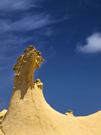 Low angle view of a desert stone rock formation